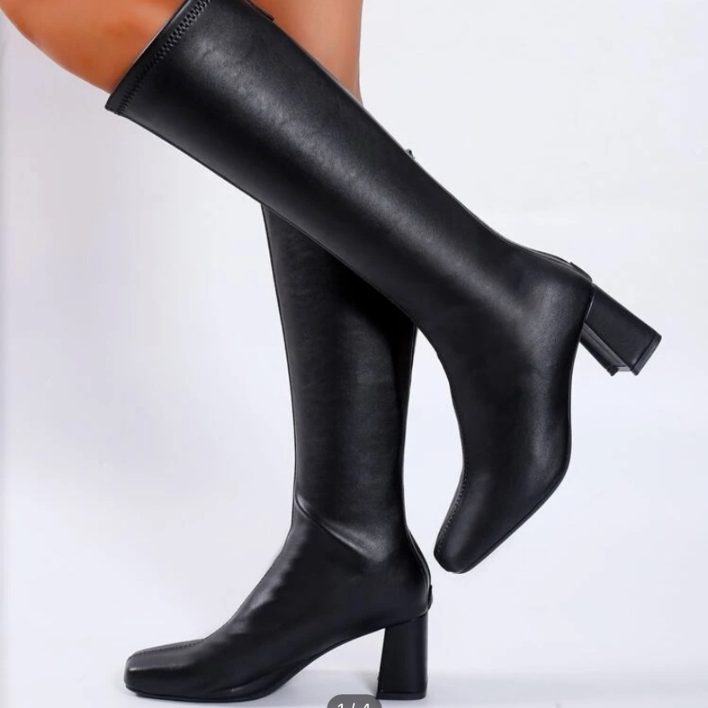 Black zip up leather boots from SHEIN, originally $37